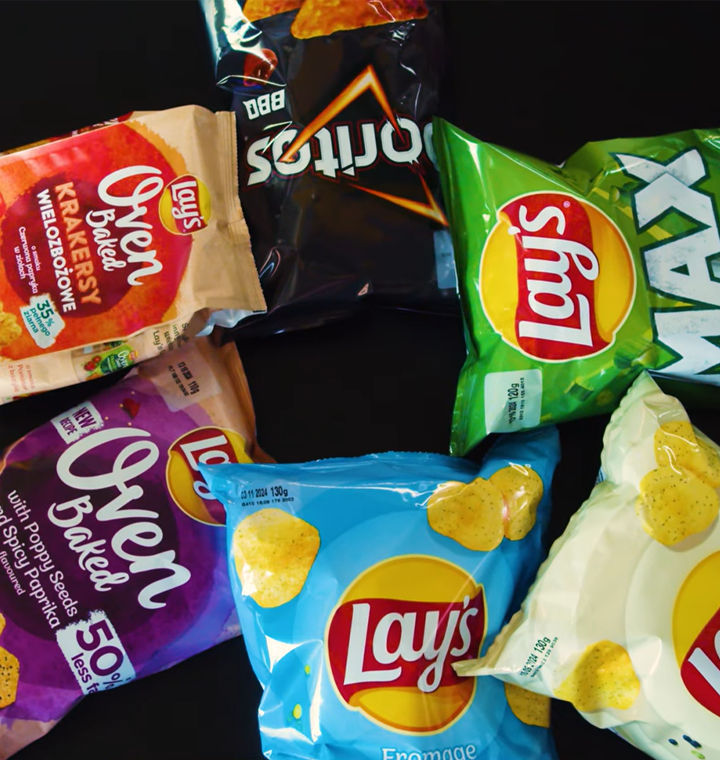 Lay's and Doritos bags sitting on a table